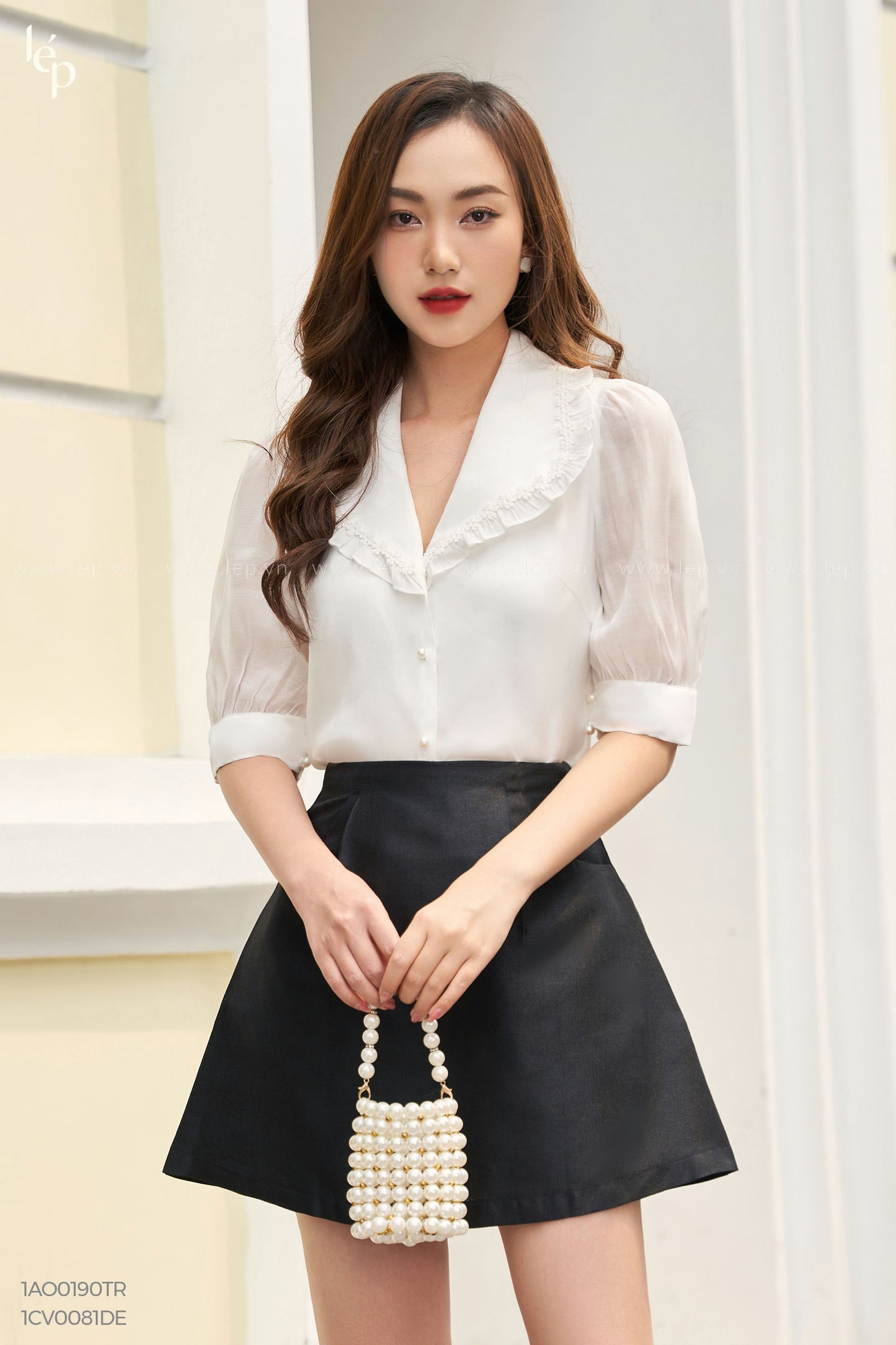 White Lace Ruffle Top And Black Skirt With Pockets